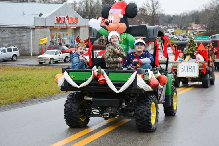 Santa opts for covered sleigh at rainy Rock Cave Christmas parade