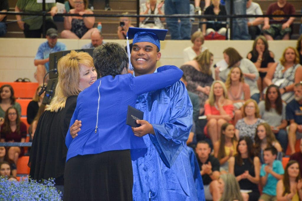 Edward Wamsley receives his diploma Friday.