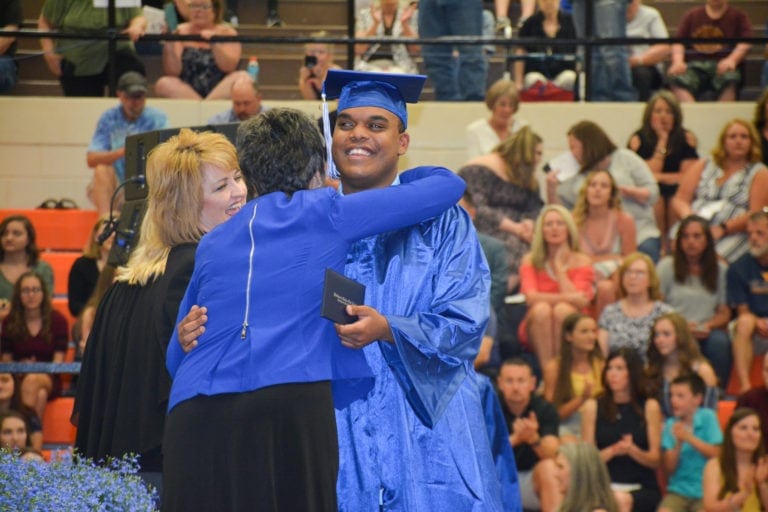 Edward Wamsley receives his diploma Friday.