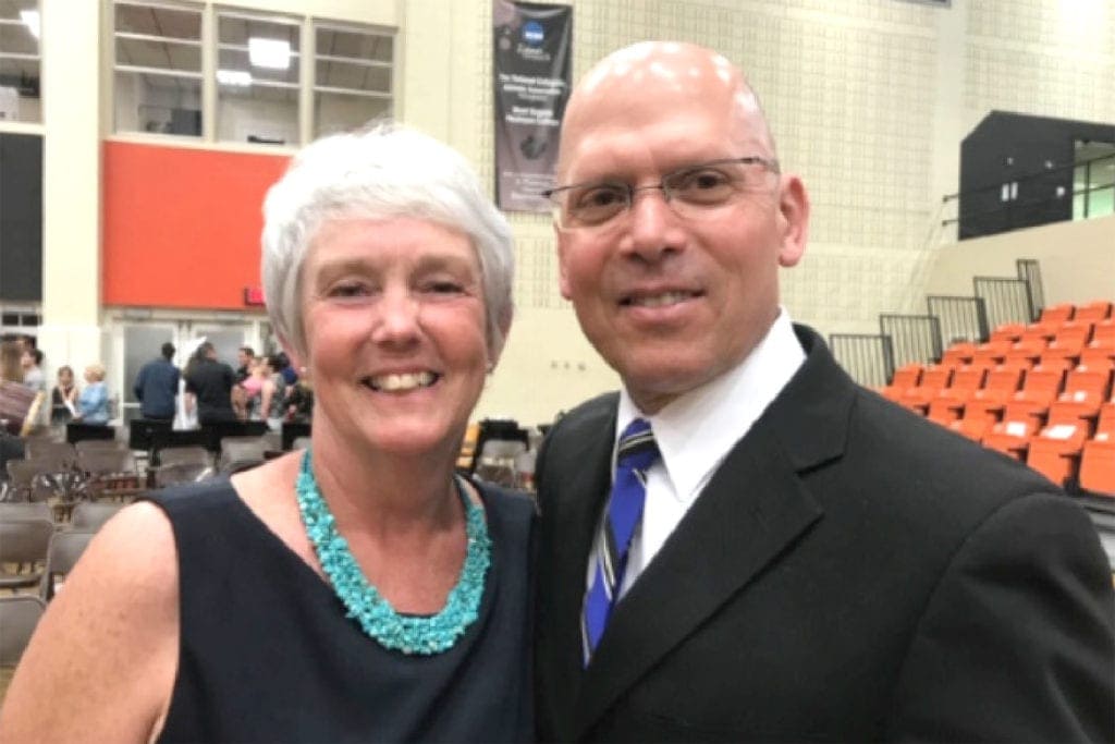 The late teacher Tappan Squires with running coach Rick Muhr.