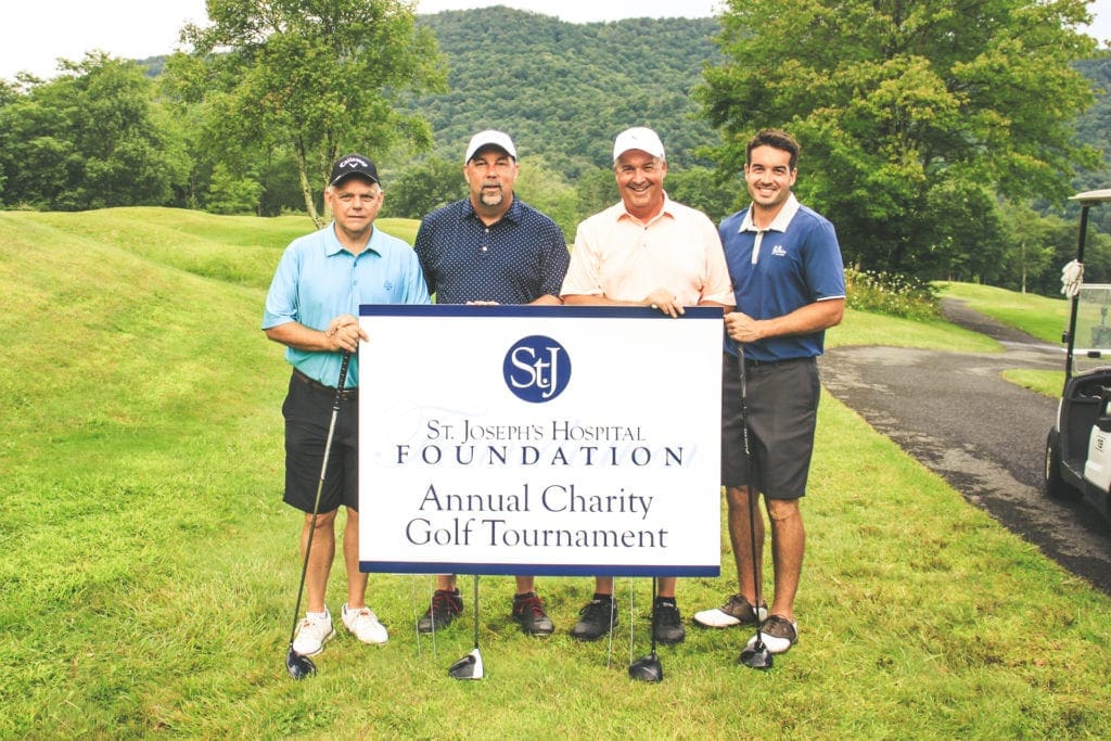 First Place: Edward Jones with players Kent Bailey and Robin Bailey and Encova Mutual Insurance with players John France and David Walker