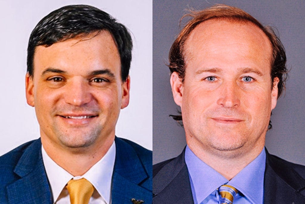 WVU Head Football Coach Neal Brown, left, former WVU Head Football Coach Dana Holgorsen, right.