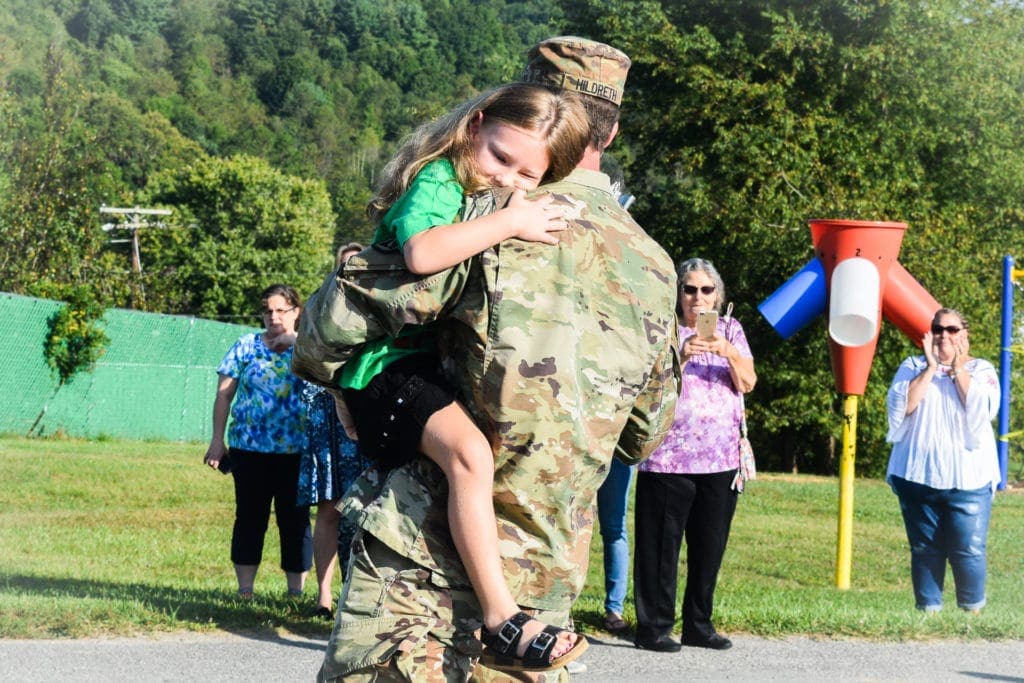 ‘Reunited, and it feels so good’: Deployed U.S. Army National Guard member surprises daughter at school
