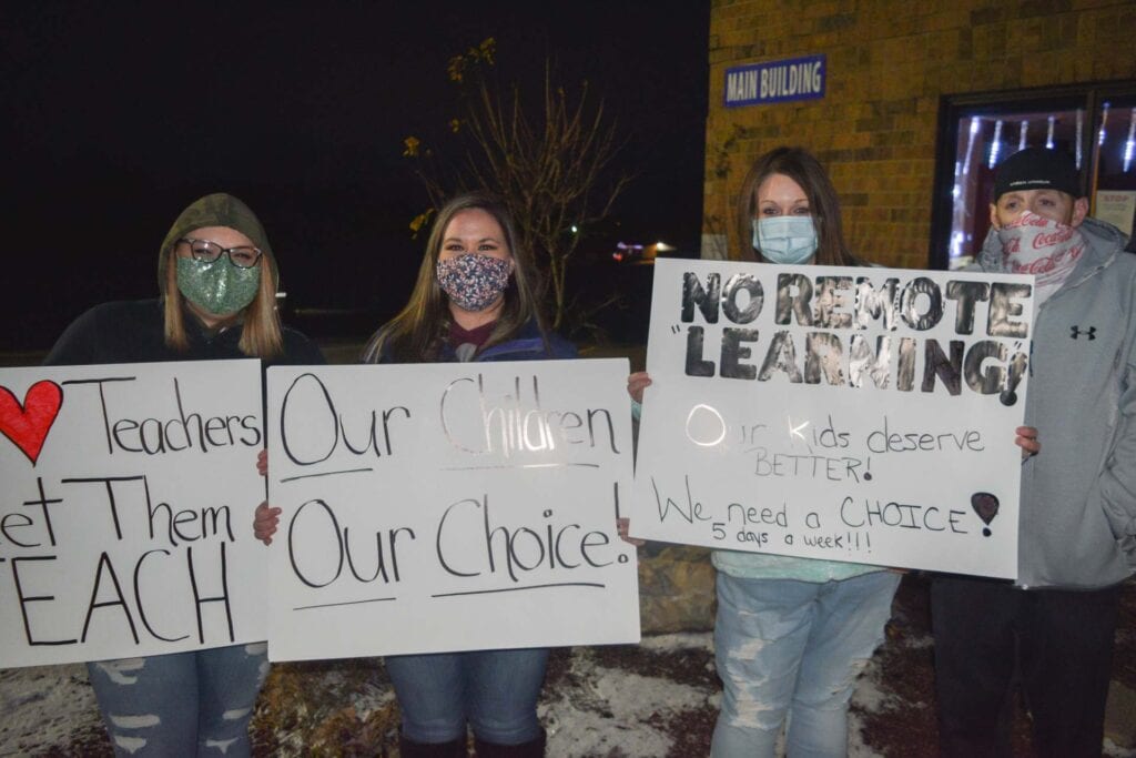 Parents show their concern for students not attending in-person classes prior to the Upshur County Board of Education meeting Tuesday at Union Elementary School. Many parents also shared their concerns with BOE members during the delegations and public comments portion of Tuesday's meeting.