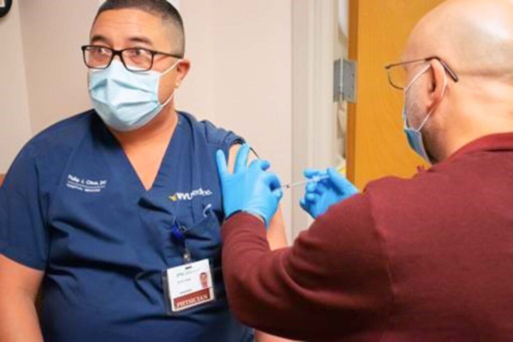 Dr. Phil Chua, DMC Hospitalist, was the first person to receive the COVID-19 vaccine at Davis Medical Center.
