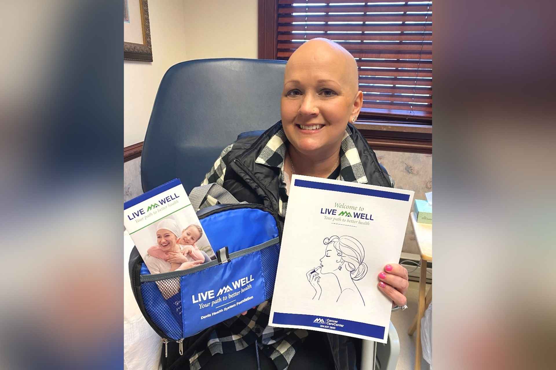 Crystal Chidester of Buckhannon receives the first LiveWell makeup kit from the Cancer Care Center, a part of Davis Medical Center.