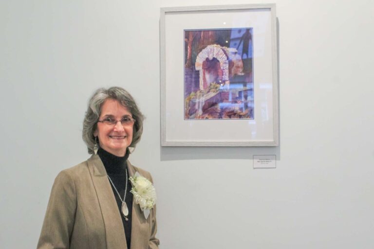 Buckhannon artist Deanna Gillum at the opening of her solo watercolor exhibit. The exhibit will be open Fridays and Saturdays from 4 p.m. to 8 p.m. through Feb. 6 at the Colonial Theater Gallery on Main Street.