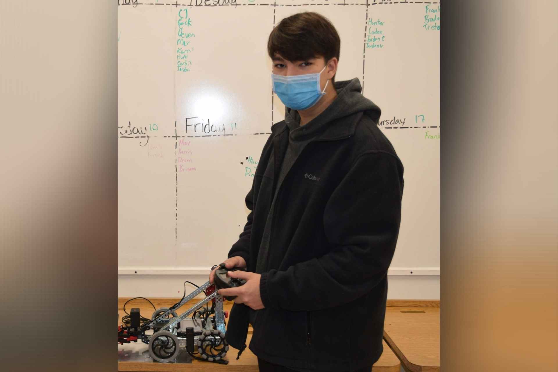 Buckhannon-Upshur High School senior Frankie Ellis with some of the gadgets that Fred Eberle Technical Center students work with daily in classes that focus on computer repair, robotics and drones.