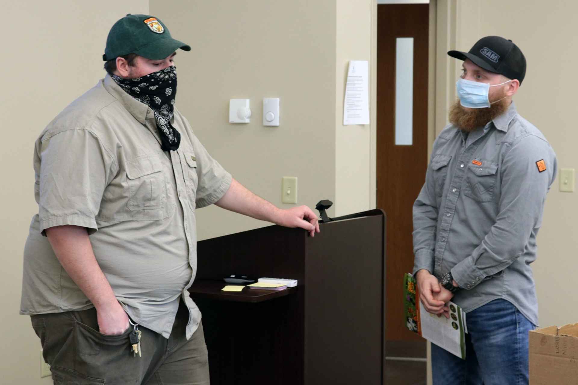 During his recent visit to Glenville State College’s Department of Land Resources, GSC graduate and current WV Division of Natural Resources Wildlife Manager Mitch Queen (left) chats with current student Jacob Petry.