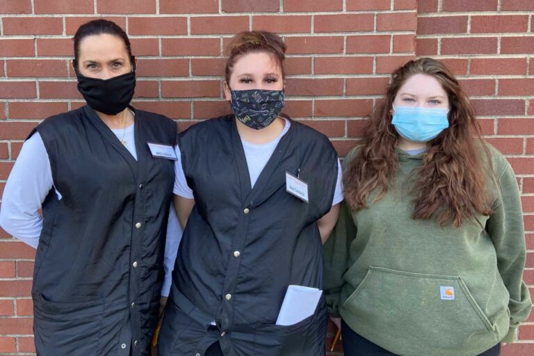Cosmetology students (left to right) Melissa Williams, Natasha Quinn, and Emily Smith