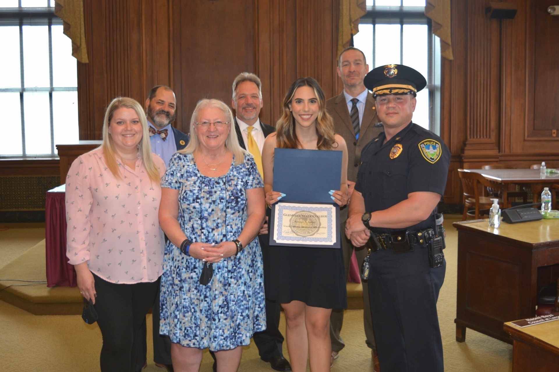 Members of the late Charleston Police Officer Cassie Johnson’s family joined Glenville State College faculty members and CPD Chief Tyke Hunt in presenting the first Cassie Johnson Memorial Scholarship to GSC student Kristen Lopez. Pictured are (l-r) Chelsea Johnson, Dr. Jeff Bryson, Sheryl Johnson, Dr. Ken Lang, Kristen Lopez, Dr. Donal Hardin, and Sgt. Tyke Hunt.