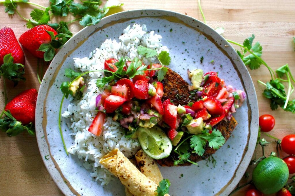 Strawberry avocado salsa over blackened swordfish