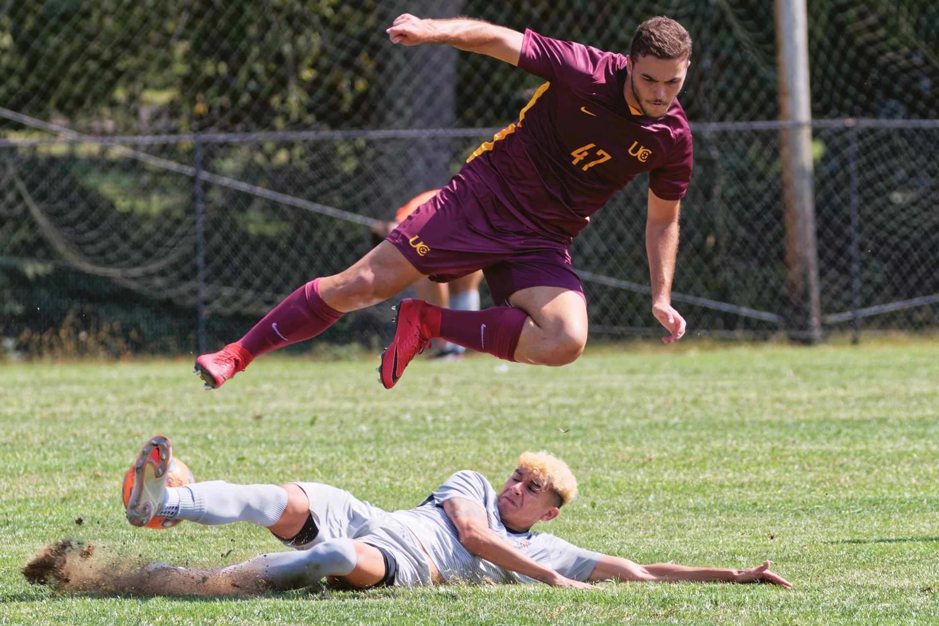 Luis Diaz wins the ball with a slide tackle during Sunday's skirmish with Charleston. (Brian Bergstrom/My Buckhannon)