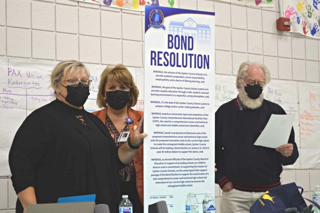 Upshur County Board of Education President Dr. Tammy Samples, Superintendent of Schools Dr. Sara Lewis Stankus and BOE member Almond present a proclamation in support of the upcoming school bond initiative.