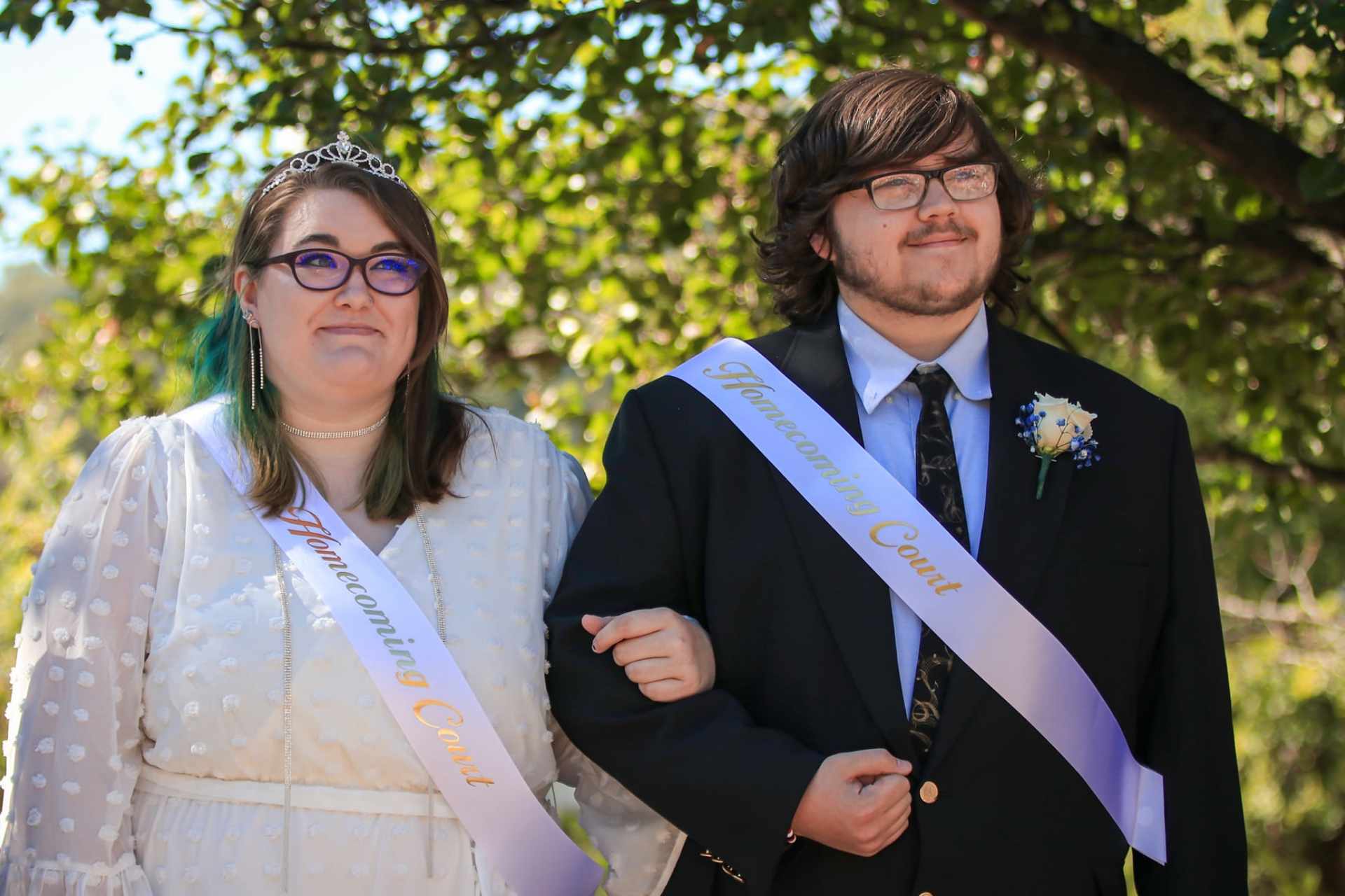 A member of the Glenville State College Homecoming Court as a Senior Princess, Keelin Howes is joined at the Coronation Ceremony by her escort, Joe Lutsy.