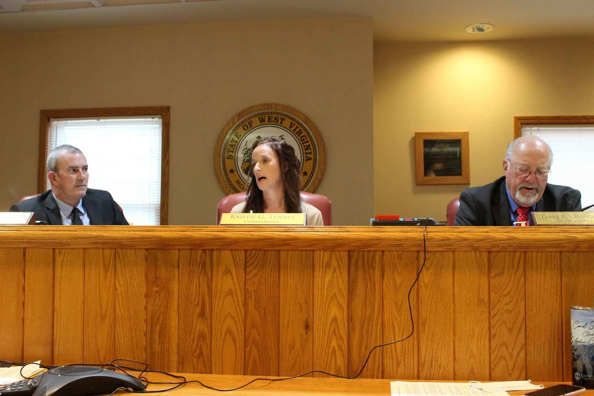 County commissioners Sam Nolte, Kristie Tenney and Terry Cutright speak via teleconference with Justin Bowers.