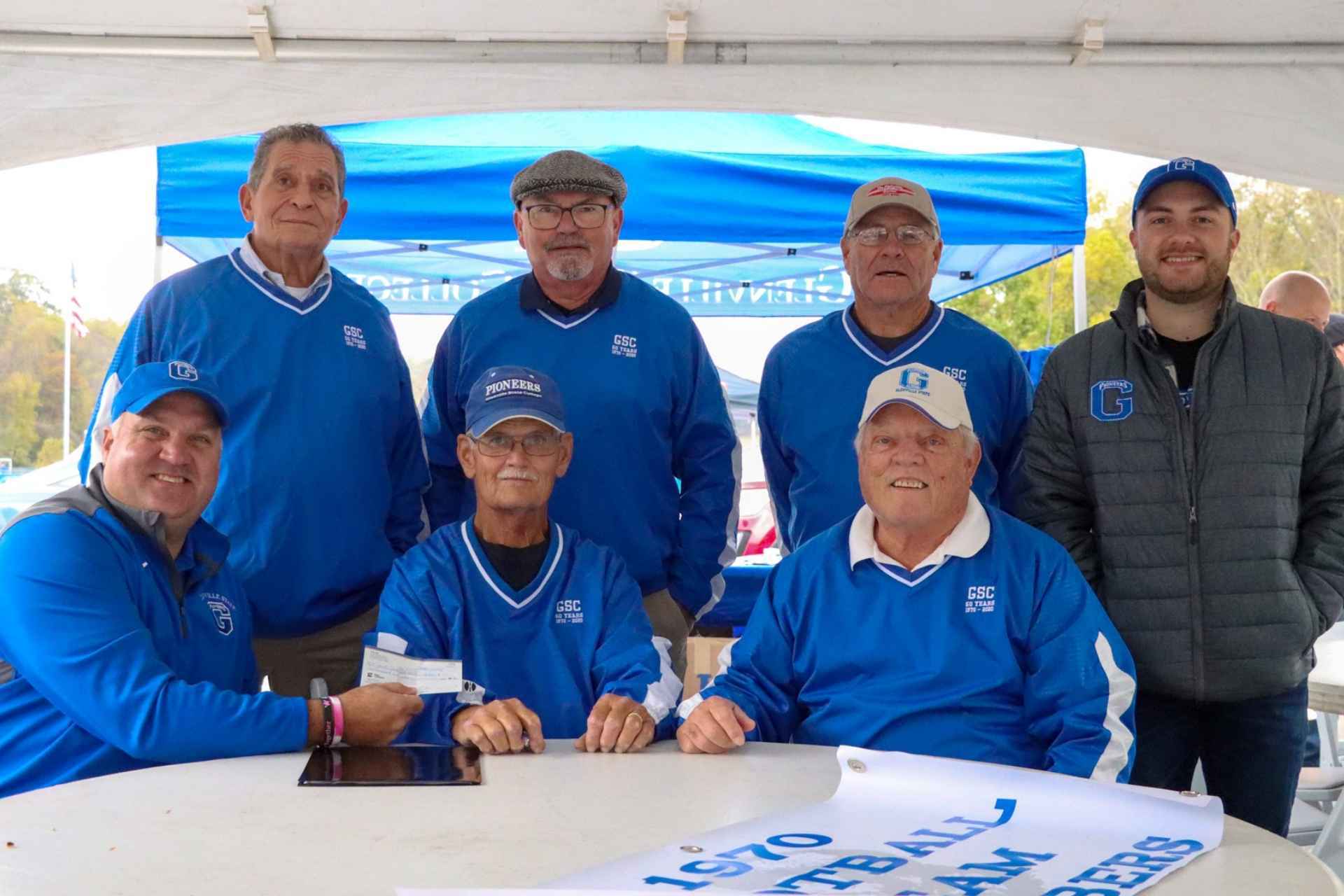Establishing donors of the Glenville State College Athletic Trainer Scholarship with GSC’s Vice President for Advancement, David Hutchison, and Director of Alumni Relations, Conner Ferguson. Seated (l-r) David Hutchison, Gary Ray, and Ron Duncan; standing Stewart “Mike” Roscoe, Steve Ash, Virgil “Pee Wee” Lacey, and Conner Ferguson.