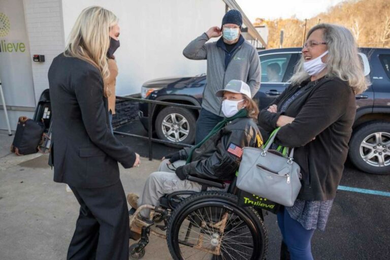 Ronald Frye, the first West Virginia citizen to purchase medicinal marijuana, attends the ribbon cutting for Morgantown’s first medical marijuana dispensary on Friday.