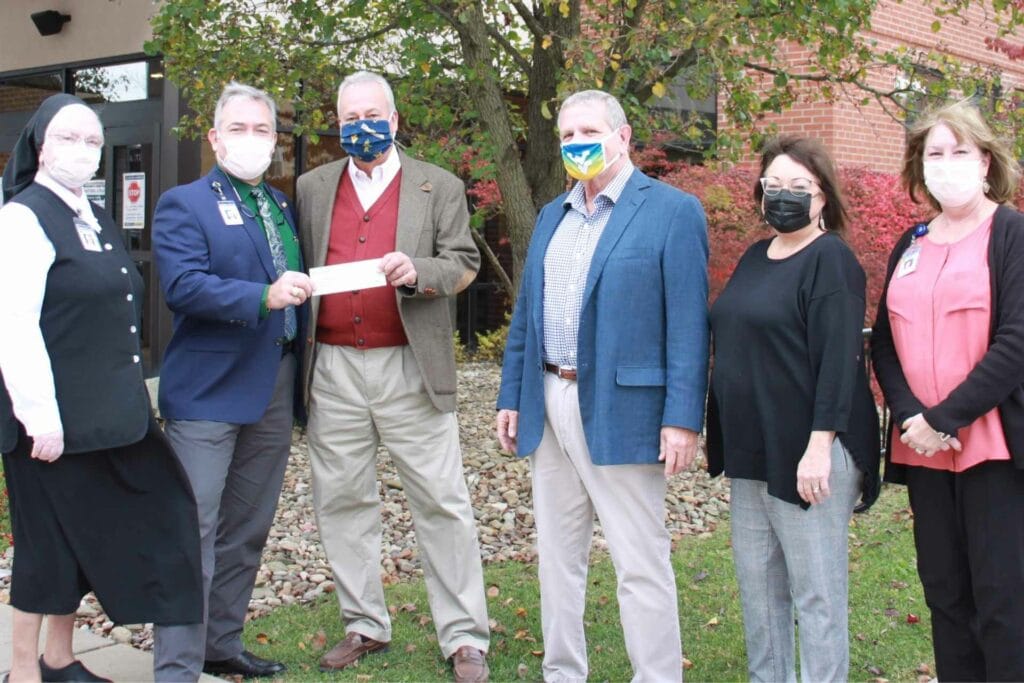 Left to Right: Sister Francesca Lowis, SAC, Vice President of Mission Integration; Skip Gjolberg, President of St. Joseph’s Hospital; Mike Sharpolisky, Exalted Ruler, Buckhannon Elks Lodge; John Haskins, President of St. Joseph’s Hospital Foundation; Traci Ellis, Foundation Board Member and Campaign Chair; and Lisa Wharton, Vice President of Marketing, Public Relations & Foundation.