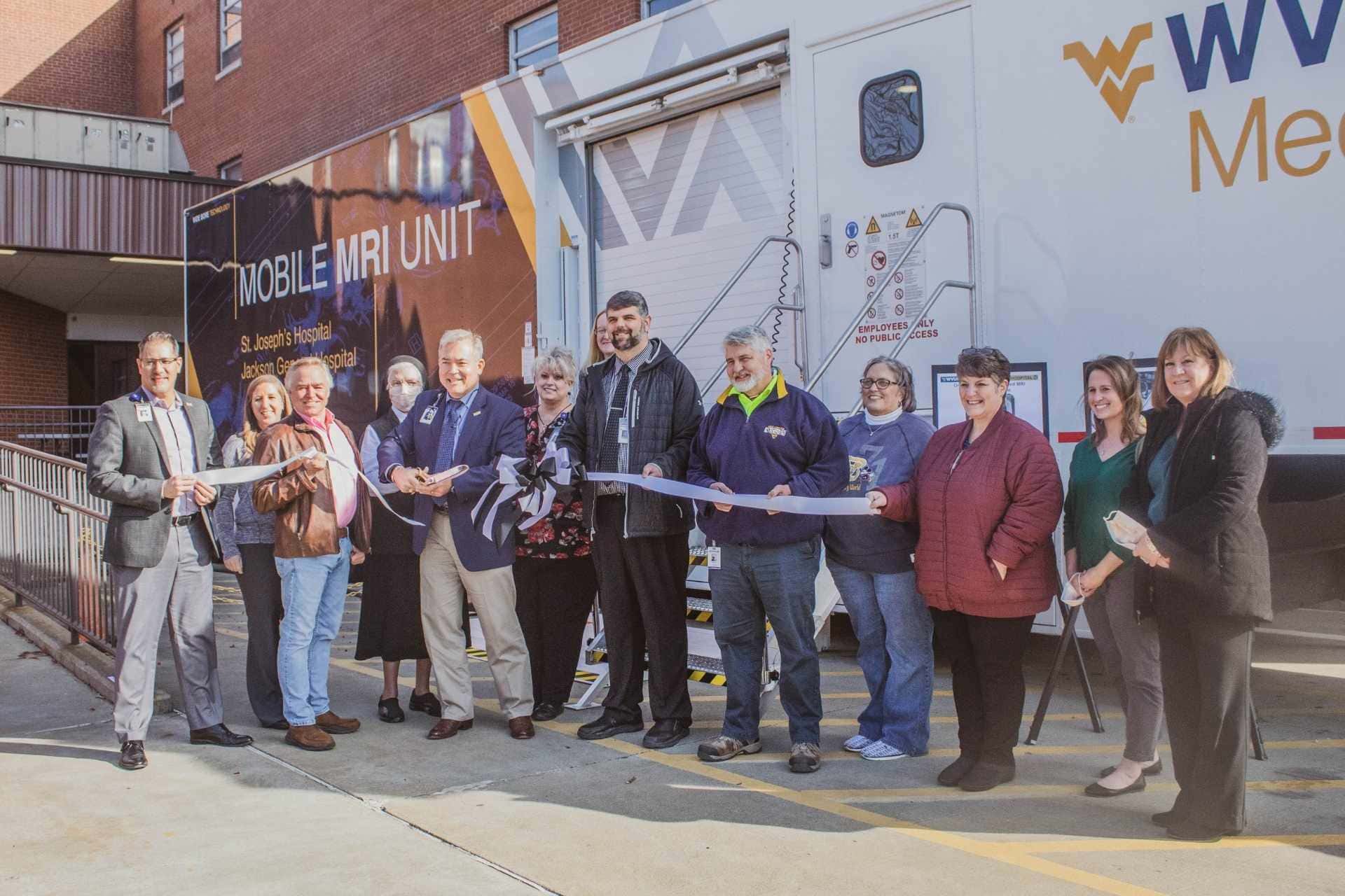 Buckhannon-Upshur Chamber of Commerce members joined representatives from WVU Medicine St. Joseph's Hospital to official open the doors to a new Mobile MRI Unit on Tuesday.