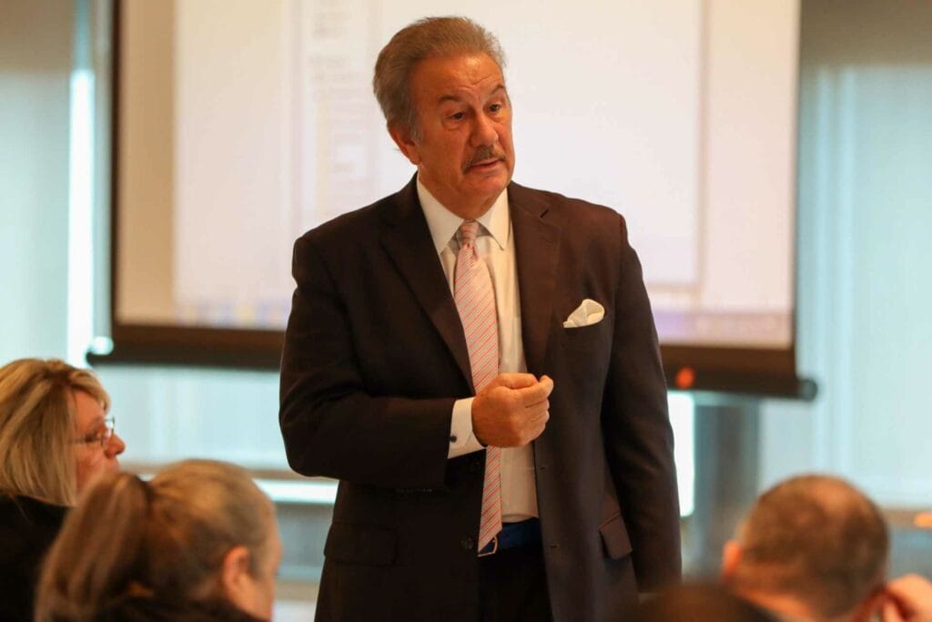 Glenville State College President Dr. Mark A. Manchin speaks to those gathered at the recent Council for Opportunity in Education workshop.