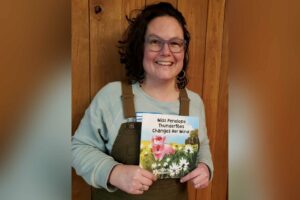 Jess Scott holds her new book, ‘Miss Penelope Thundertoes Changes Her Mind.’ The book is geared for children aged 3 to 8 -- but it’s also for anyone who has a love for pigs.