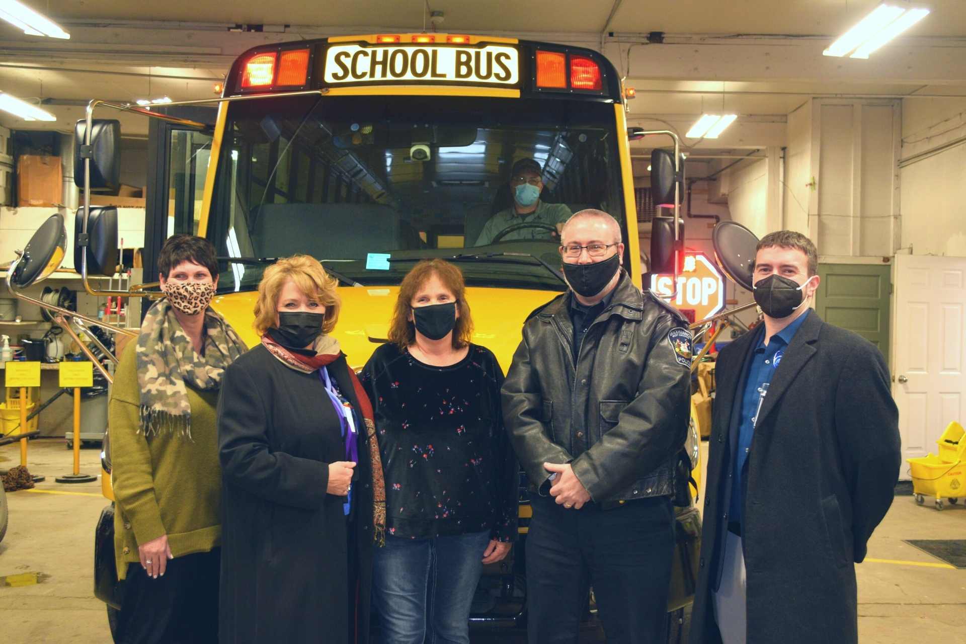Pictured with the new lights on a bus are Upshur County Schools Transportation Director Jodie Akers, Upshur County School Superintendent Dr. Sara Lewis Stankus, Upshur County Schools Bus Operator Cathy Grill, Buckhannon Police Chief Matthew Gregory and Upshur County Schools Director of Safety and Emergency Preparedness Matthew Sisk.