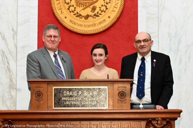 Stephanie Santilli (center) paged for the 13th time during the February 21 Session of the West Virginia Legislature. She is pictured with her State Senators, Dave Sypolt and Randy Smith.
