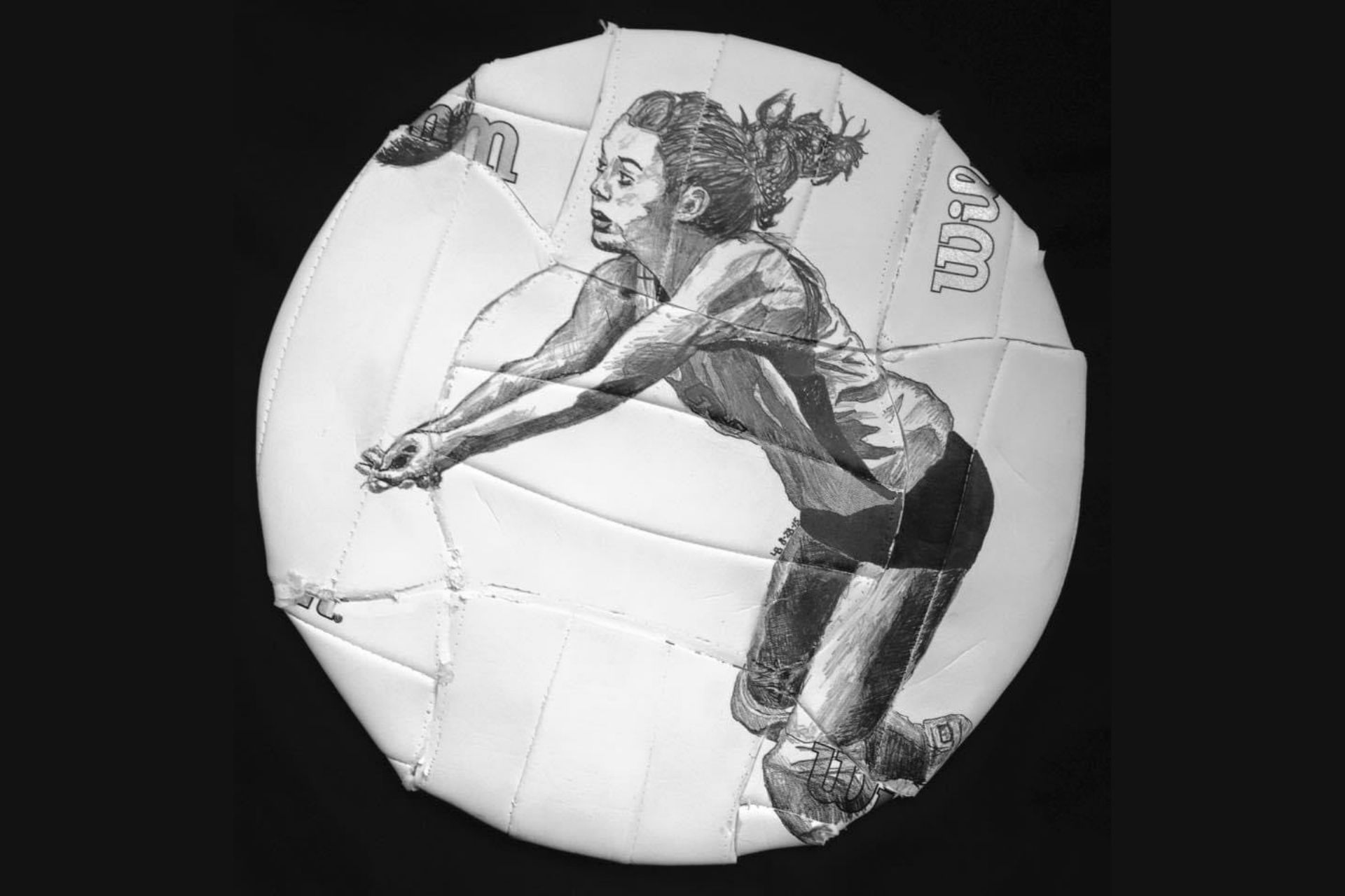 Artist Levi Bender uses unique canvas formats, such as this volleyball.