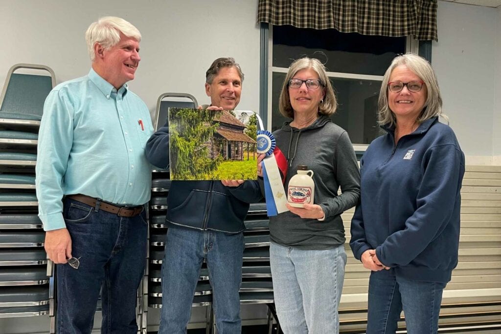Left to Right - B-U Camera Club President Gary McCoy; MSF Exhibit Chair Anthony Ovies; Sandra Miller, People's Choice Award Winner; and Debbie Morgan, Maple Syrup Festival Representative