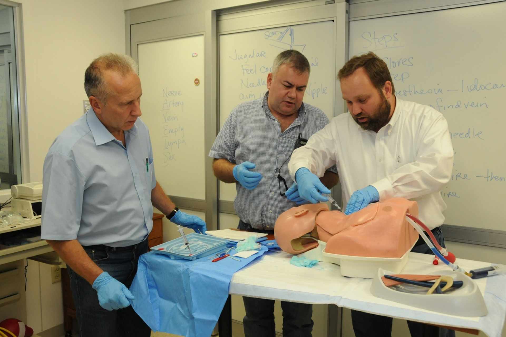 A group of Ukrainian trauma surgeons participate in Advanced Trauma Life Support and Rural Trauma Team Development Course training at West Virginia University in 2013 as part of a collaboration with the American College of Surgeons and the World Federation of Ukrainian Medical Associations in the United States.