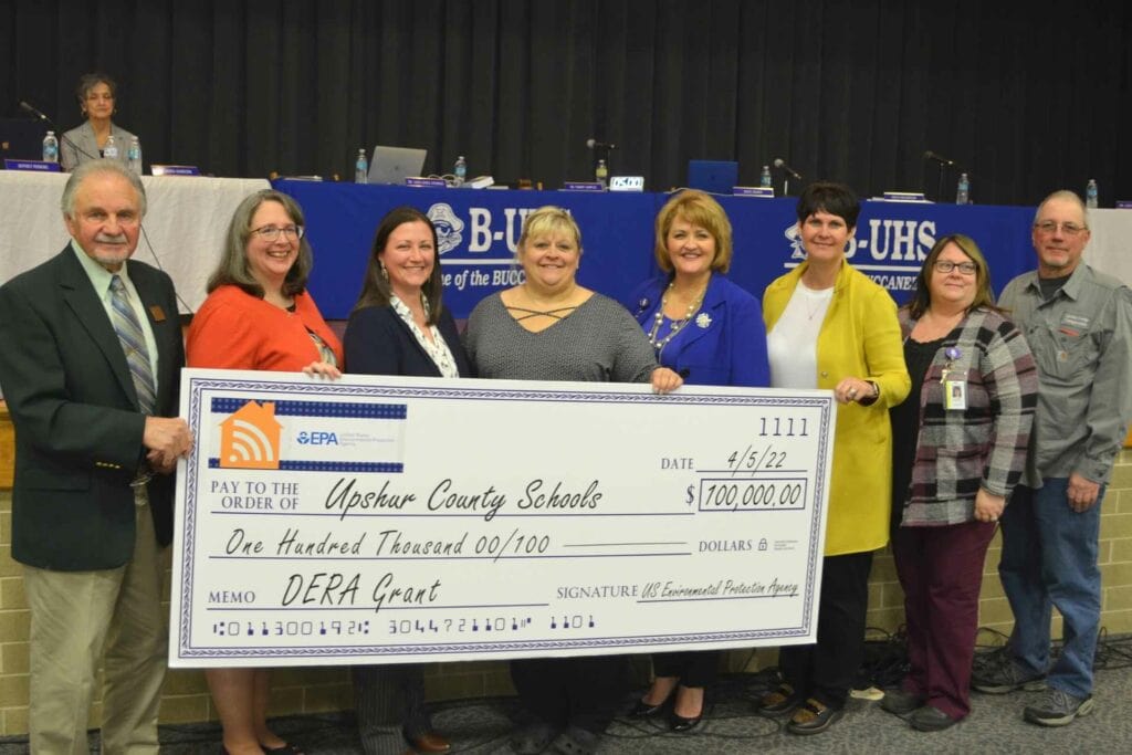 During Tuesday’s Upshur County Board of Education meeting Tuesday, an announcement was made that Upshur County Schools received its third-in-a-row DERA grant, this year for $100,000, enabling Upshur County Schools to replace five buses. Making the presentation was Frank Jezioro, representative of Senator Joe Manchin, D-WV. Accepting the grant are Upshur County BOE member Kristi Wilkerson, Upshur County BOE Vice President Katie Loudin, Upshur County BOE President Dr. Tammy Samples, Upshur County Superintendent of Schools Dr. Sara Lewis Stankus, Upshur County Schools Director of Transportation Jodie Akers, Upshur County Schools Transportation Supervisor Stephanie Bennett and Upshur County Chief Mechanic Rick Wentz.