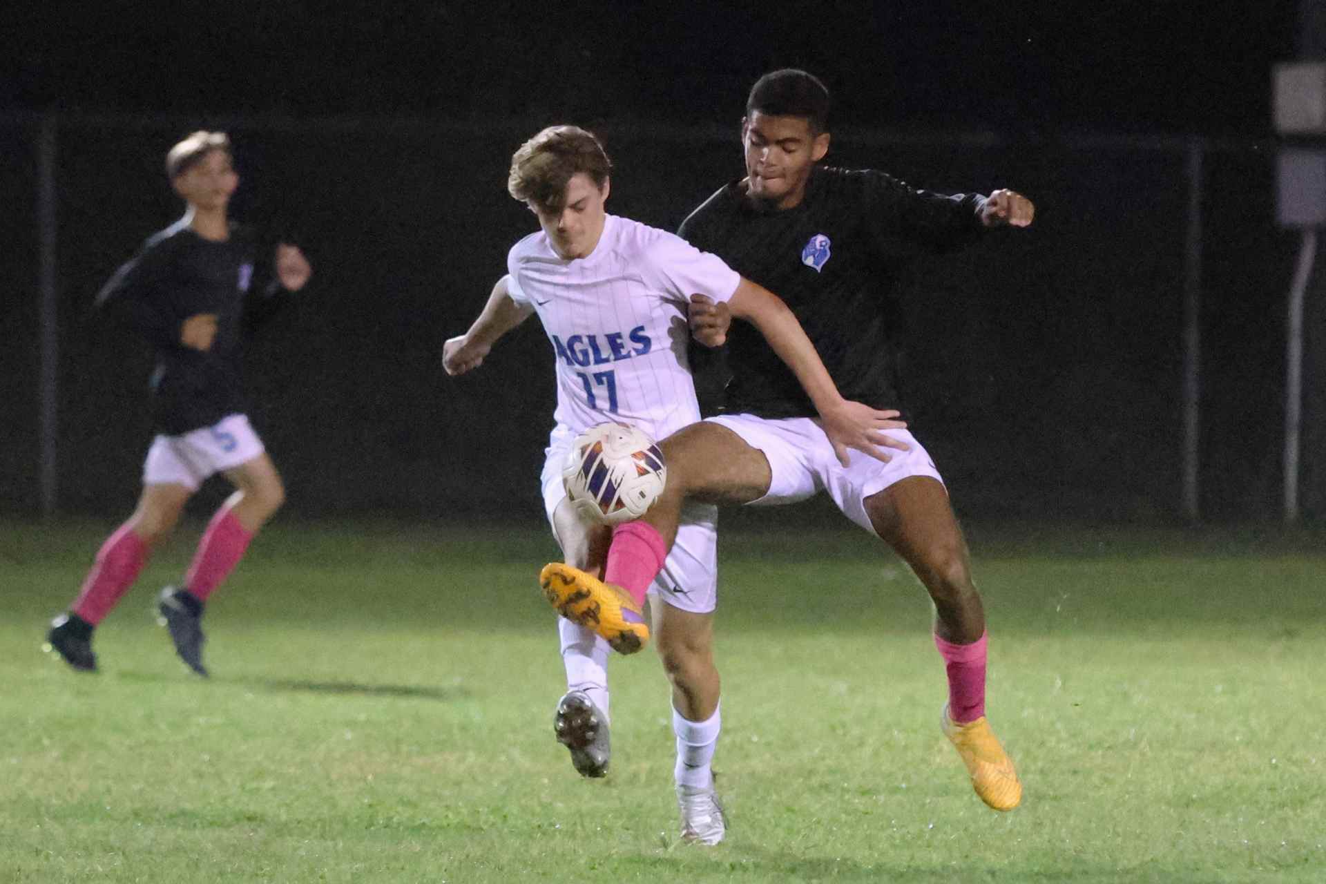 Buckhannon-Upshur's Tim Snyder and Robert C. Byrd's Jackson McKane battle for a loose ball during their contest Thursday night that ended in a 0-0 tie. (Bobbie Hatcher/My Buckhannon).