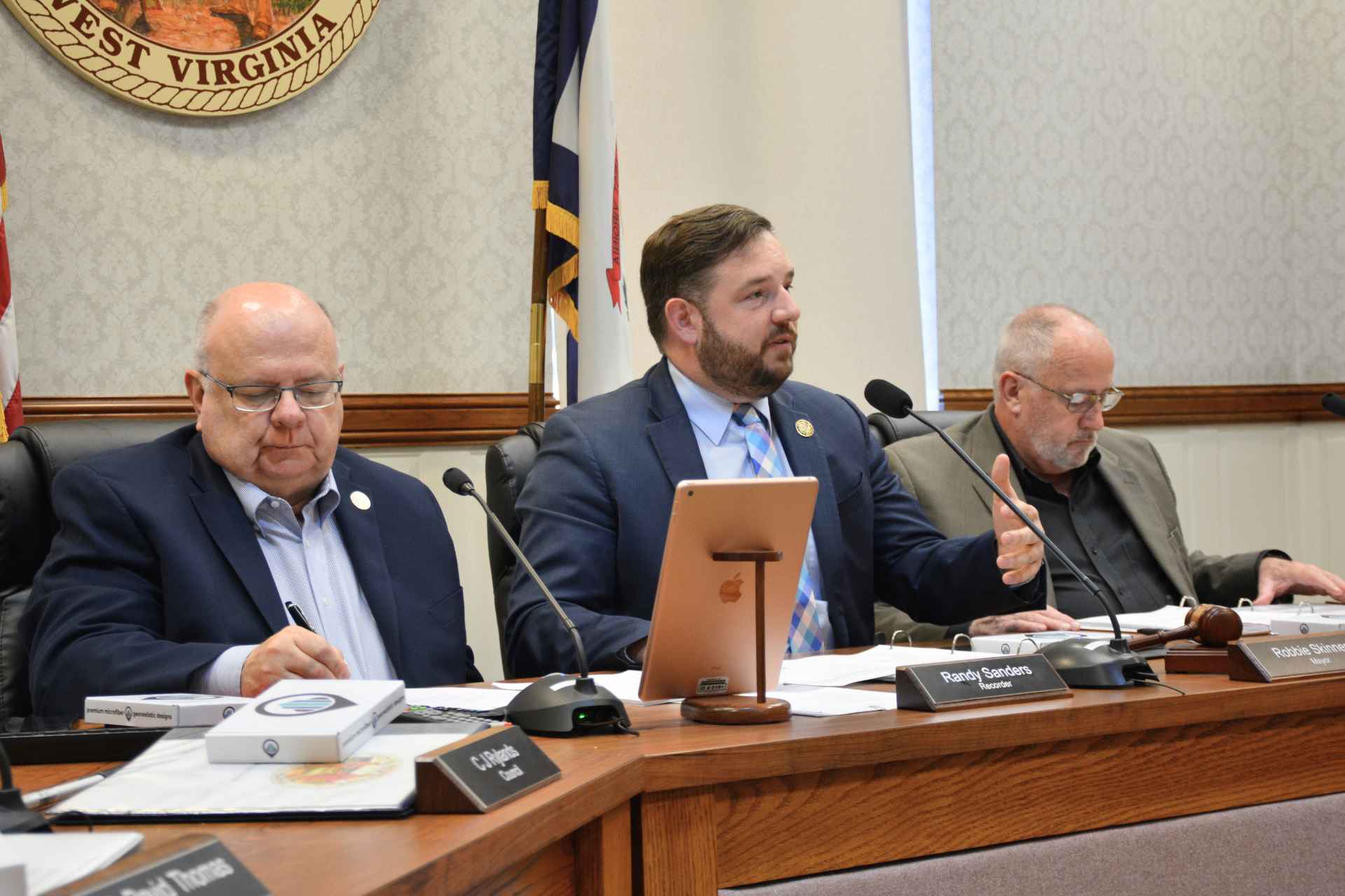 Pictured, from left, are Buckhannon City Recorder Randy Sanders, Mayor Robbie Skinner and council member Jack Reger at Buckhannon City Council’s April 18 meeting. (Katie Kuba / My Buckhannon)
