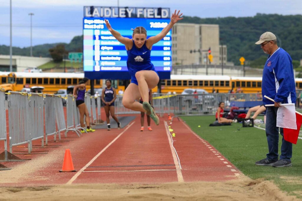 Carlyle wins regional long jump, advances to states in two other events along with 4 x 800-meter relay squad for Lady Buc track and field team