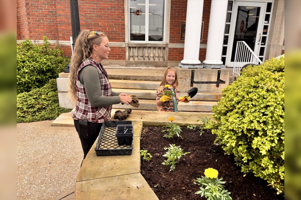 Upshur County second graders plant marigolds around the community
