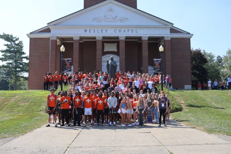 Students gather for a 2025 orientation photo in front of Wesley Chapel at West Virginia Wesleyan College