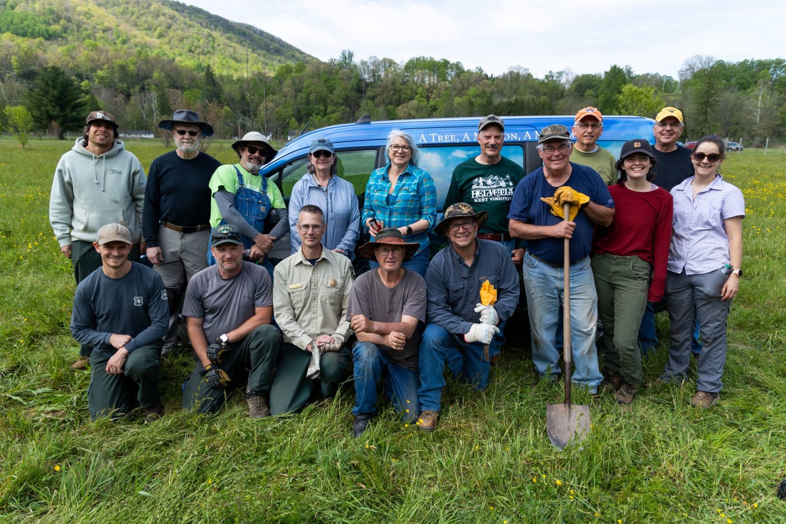 A group of West Virginia American chestnut association volunteers pose for a photo.