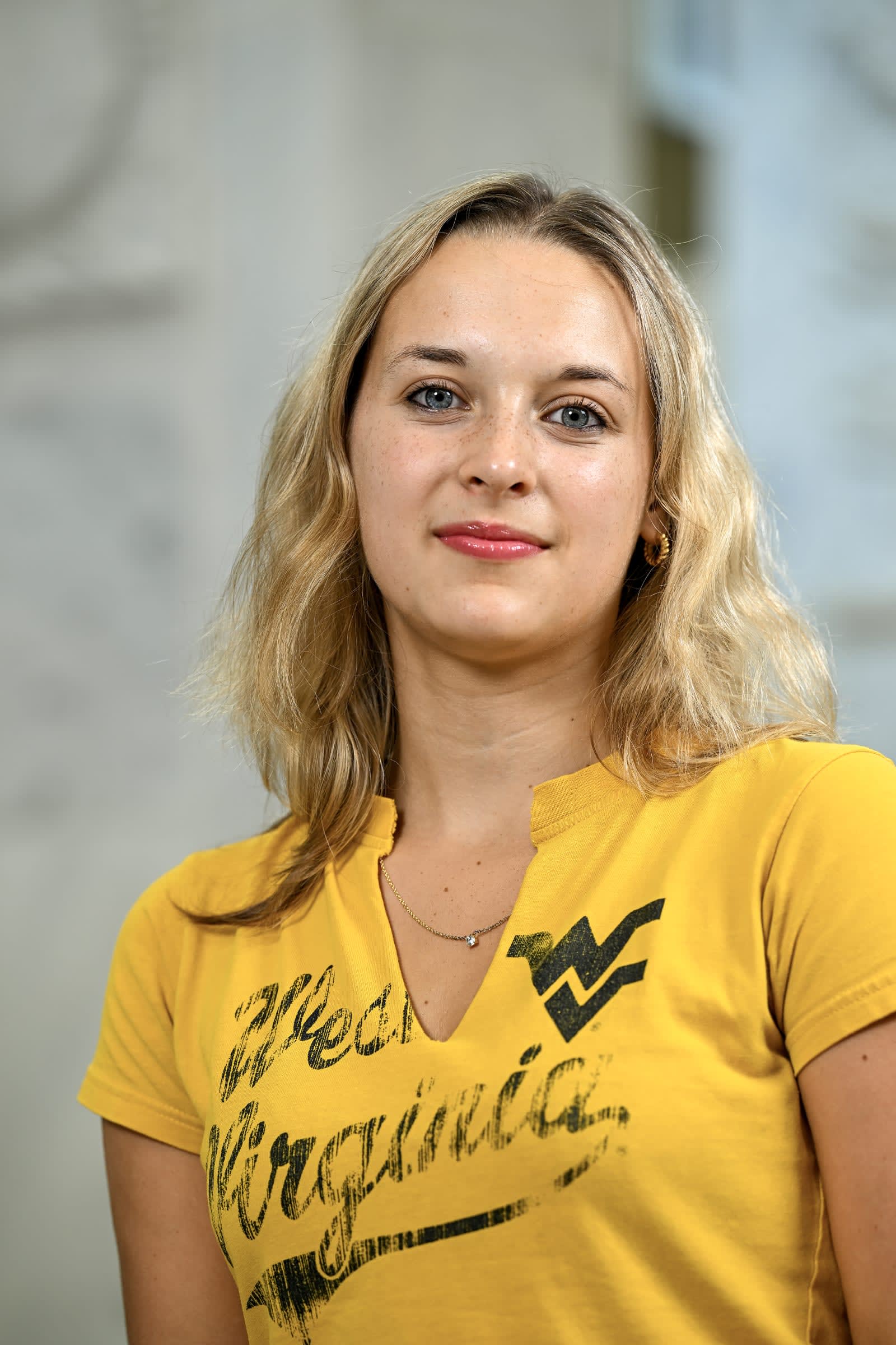 Sophia Bell wearing a WVU shirt.