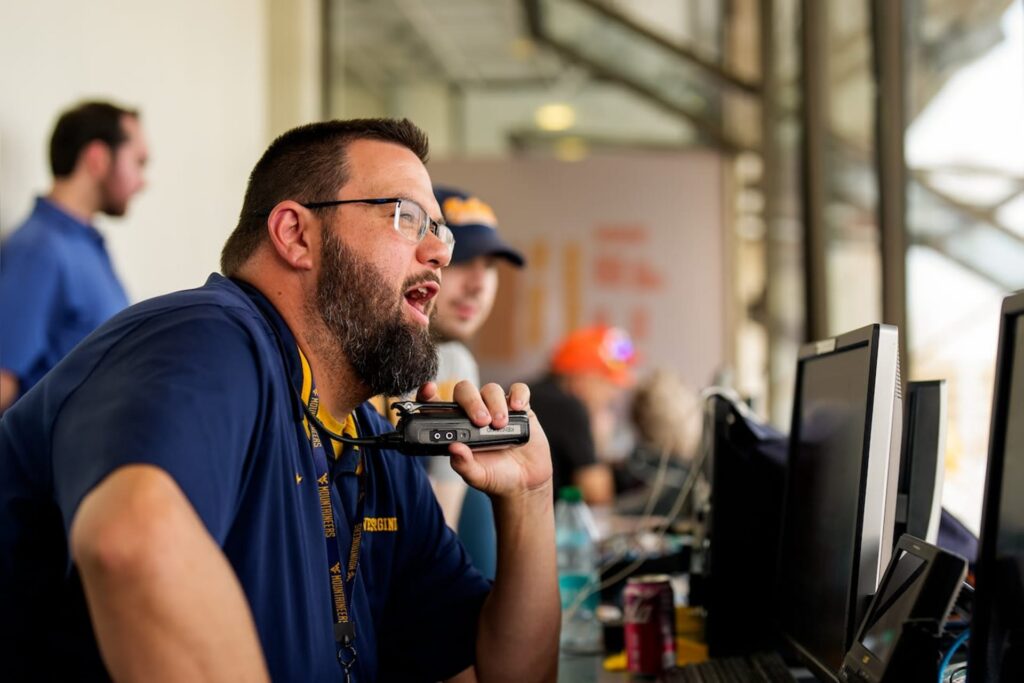 Hey Mr. DJ: WVU’s game day puppet master keeps 60,000 fans plugged in