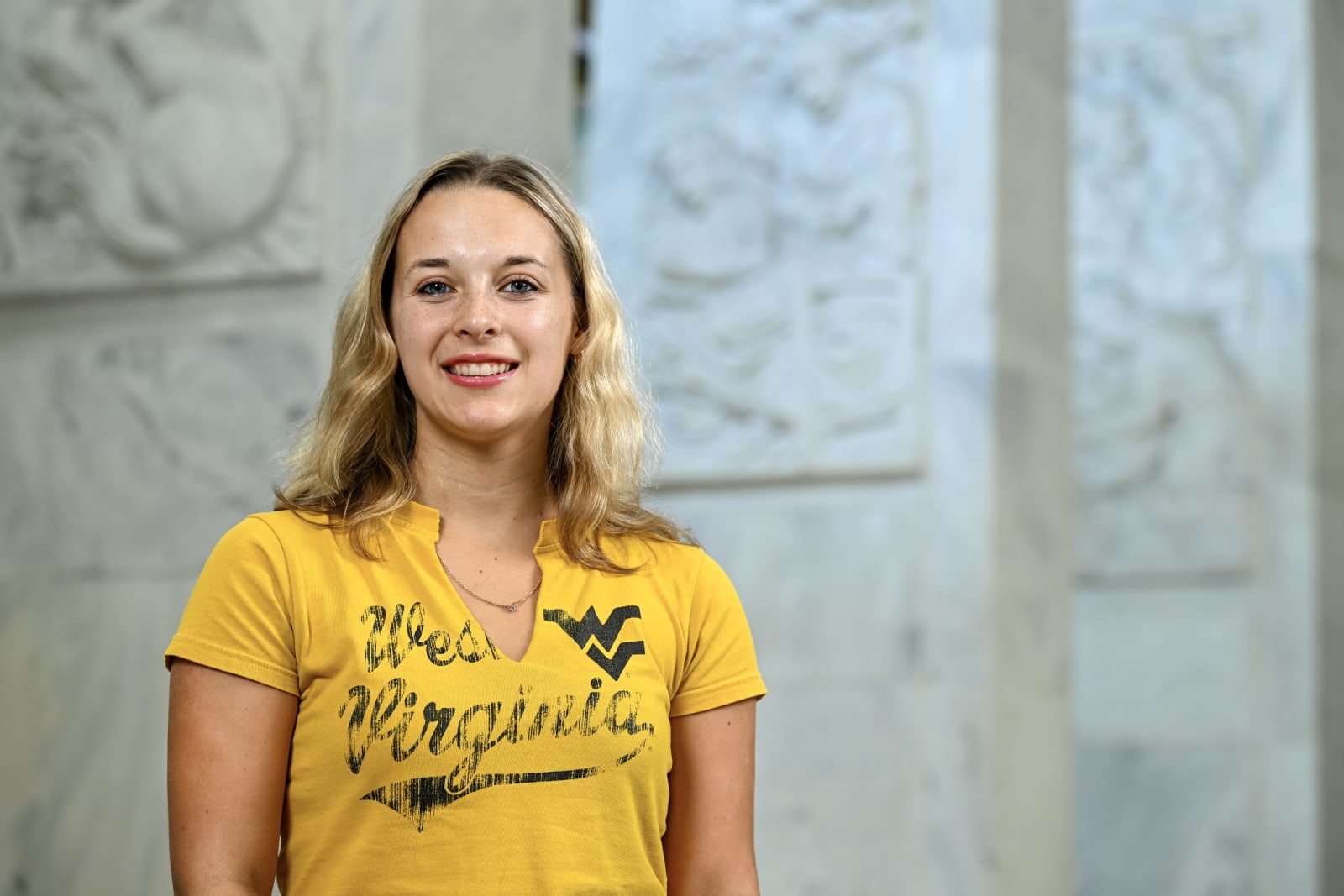 Sophia Bell wearing a WVU shirt.