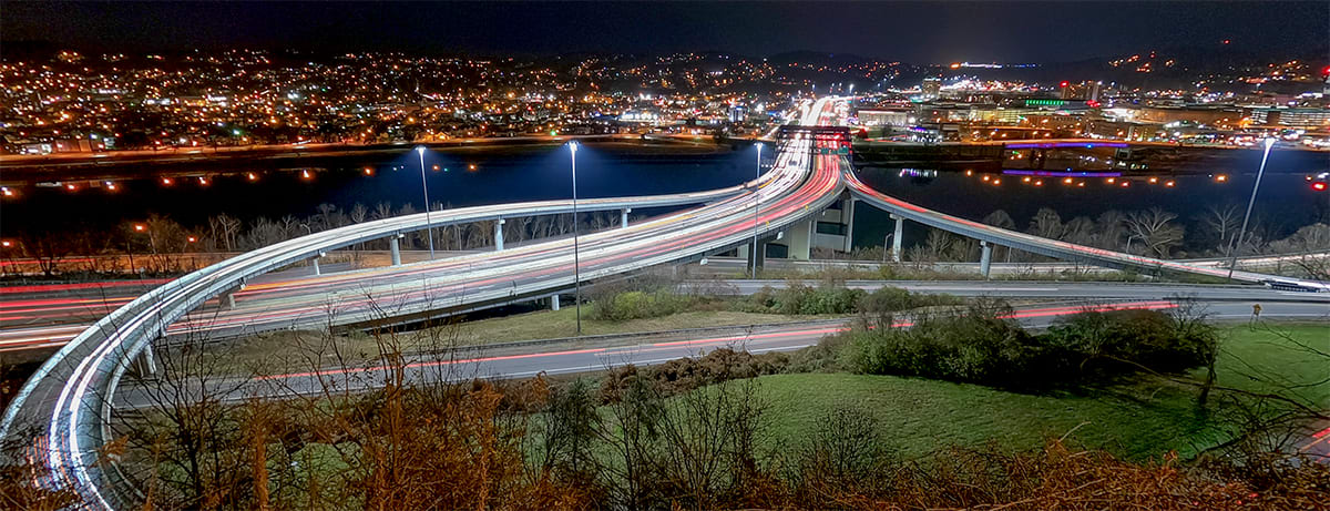 The Fort Hill Bridge and Charleston at night