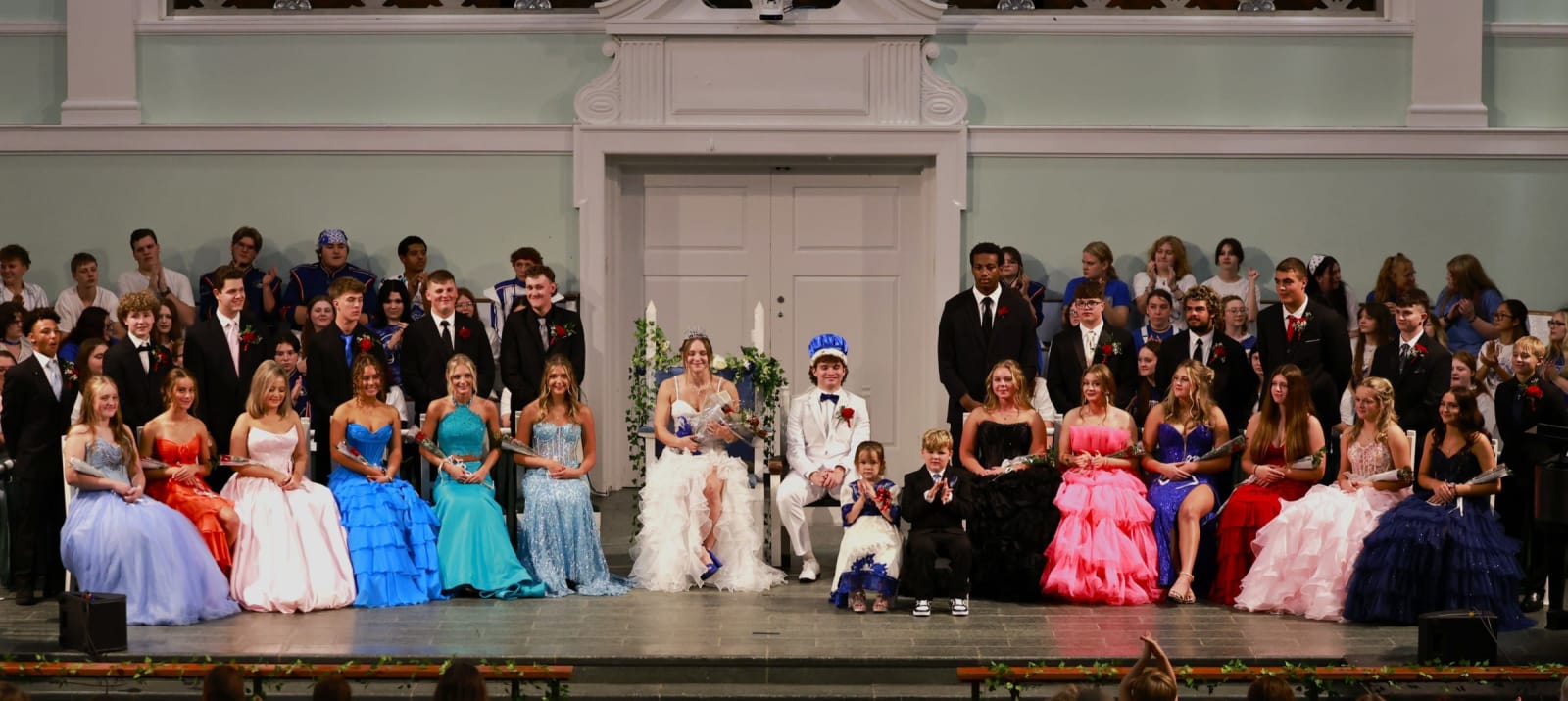 The B-UHS homecoming court poses across the chapel stage during coronation.