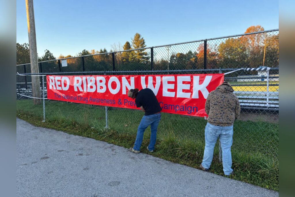 B-UHS students hang drug prevention banner for Red Ribbon Week